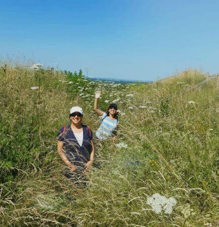 women and people active in the wildflowers in the Chilterns AONB