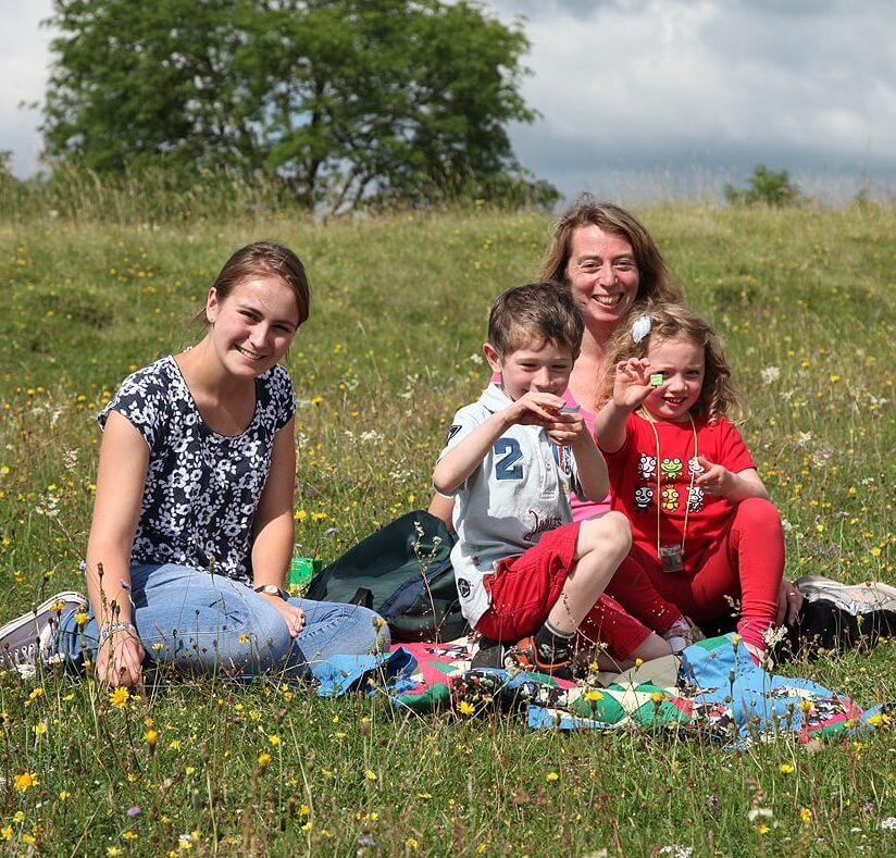 A family having a Picnic at Swyncombe Downs in the Chilterns AONB