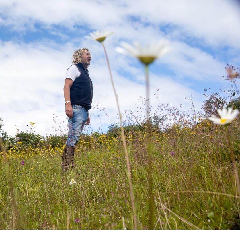 Farmer Andrew Stubbings in chalk grassland Manor Farm