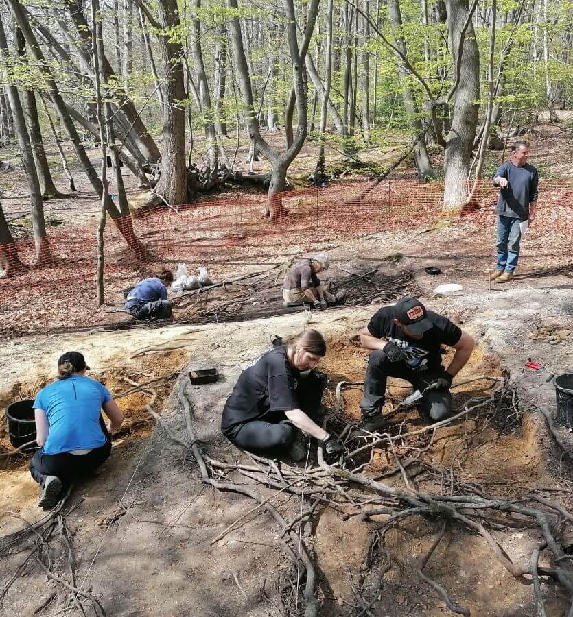 A photograph of archaeologists on a dig at burnham beeches in the chilterns
